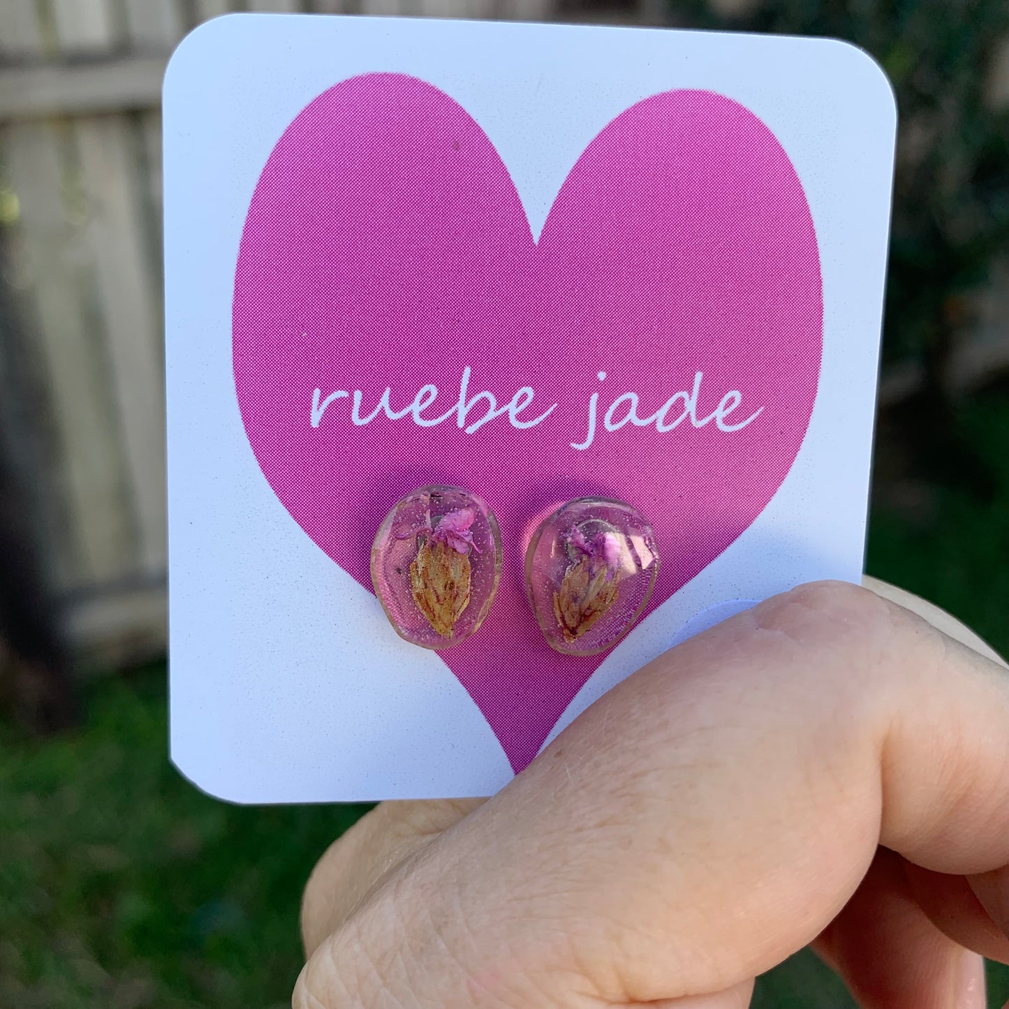 resin stud earrings with purple Australian Daisy flowers