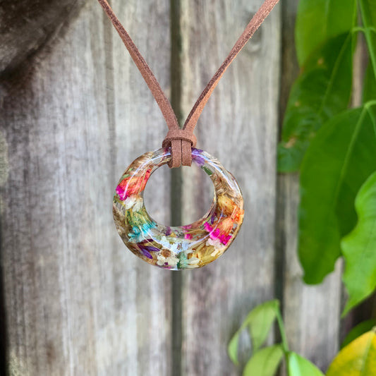 Colourful floral pendant on a vegan brown leather cord