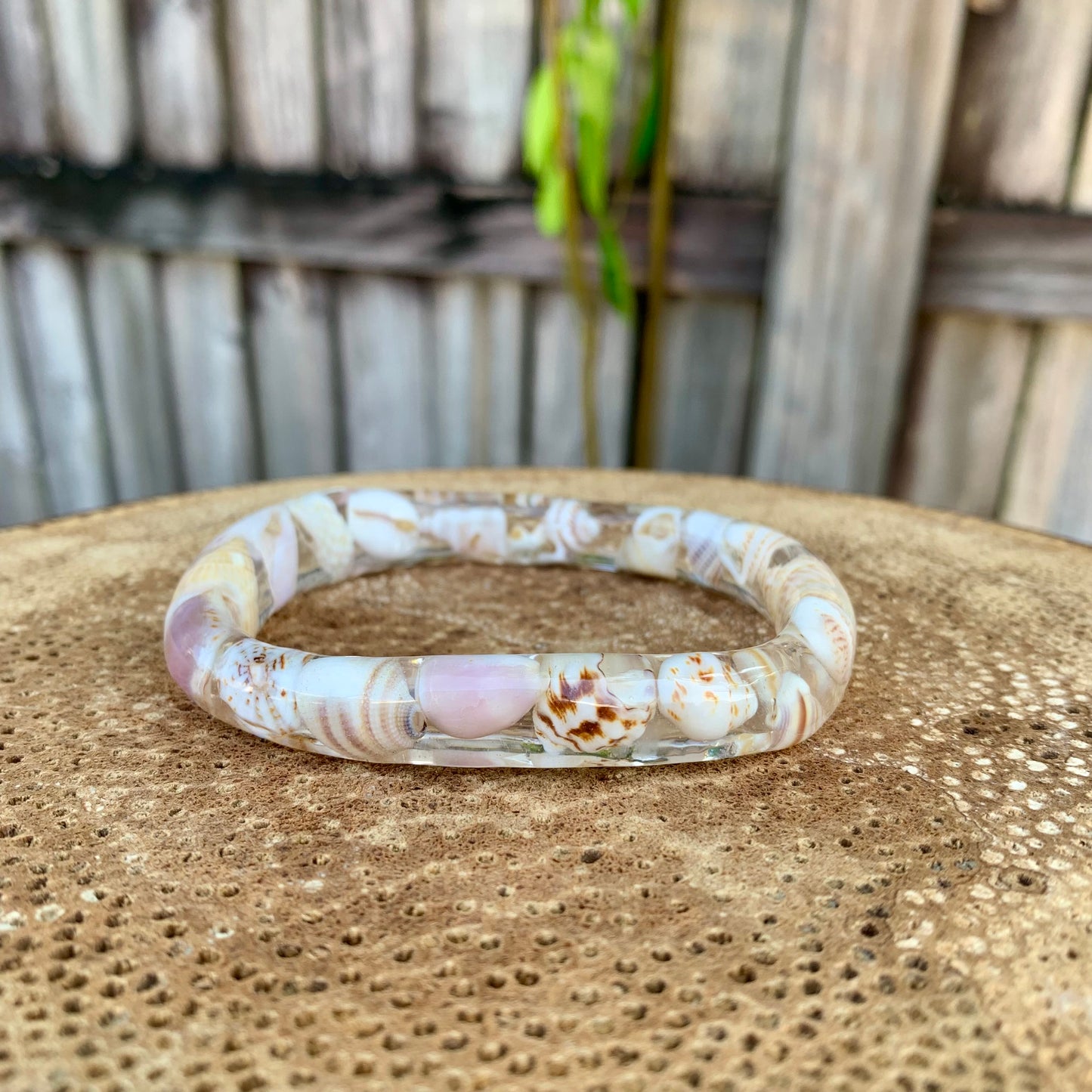 Resin bangle with real shells. 