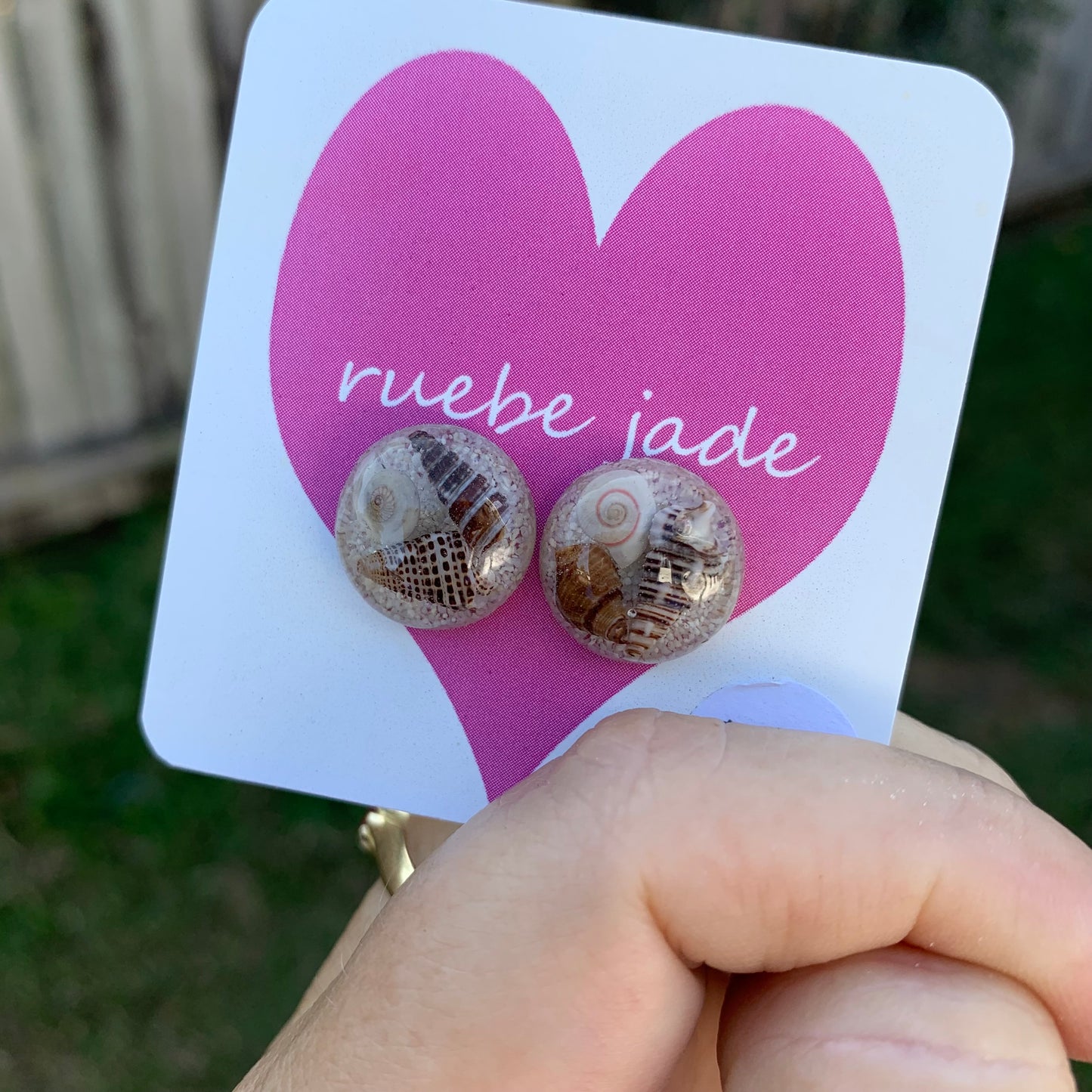 Shell resin earrings with tiny shells
