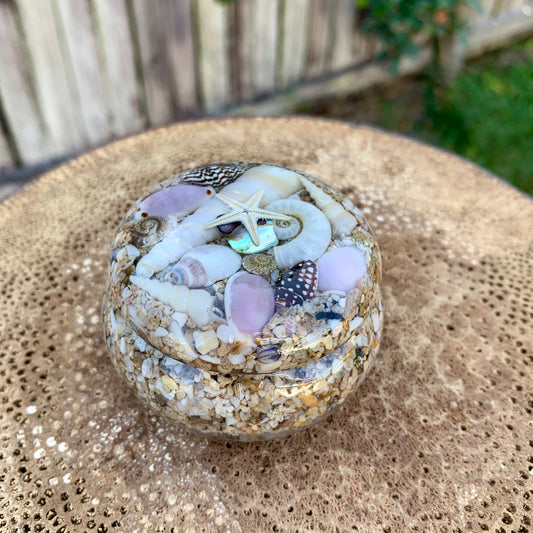 Mermaid inspired jewellery pot made with resin, seashells, starfish and paua shell. 