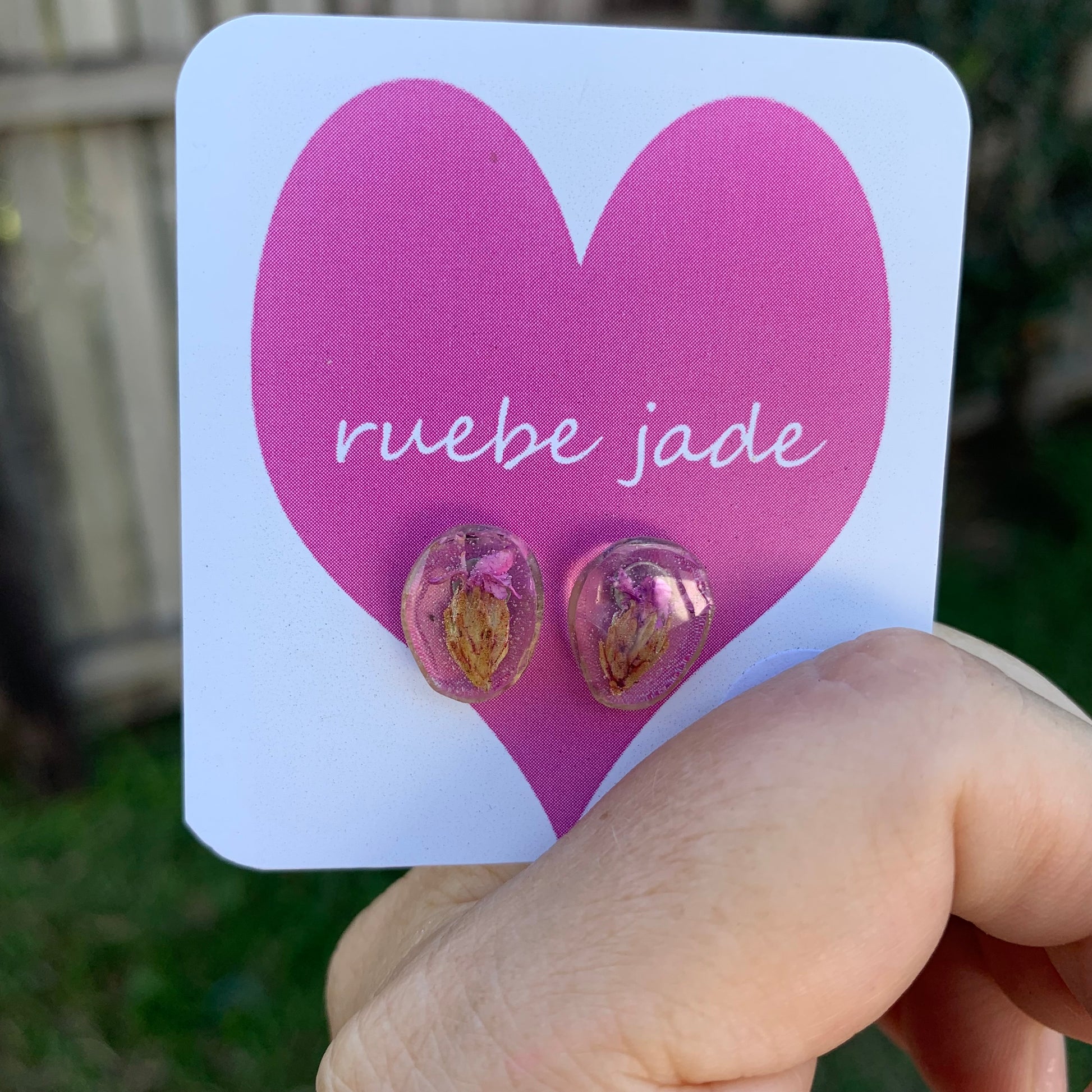 resin stud earrings with purple Australian Daisy flowers